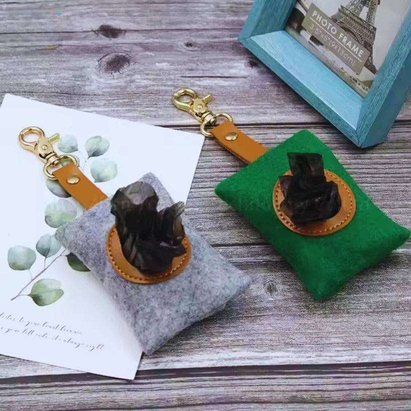 Felt dispenser for dog waste bags