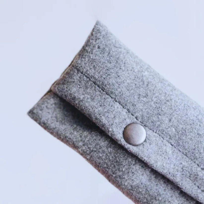 Felt dispenser for dog waste bags