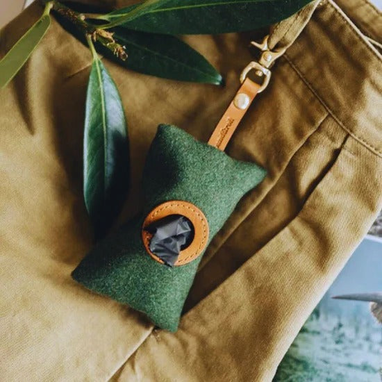 Felt dispenser for dog waste bags